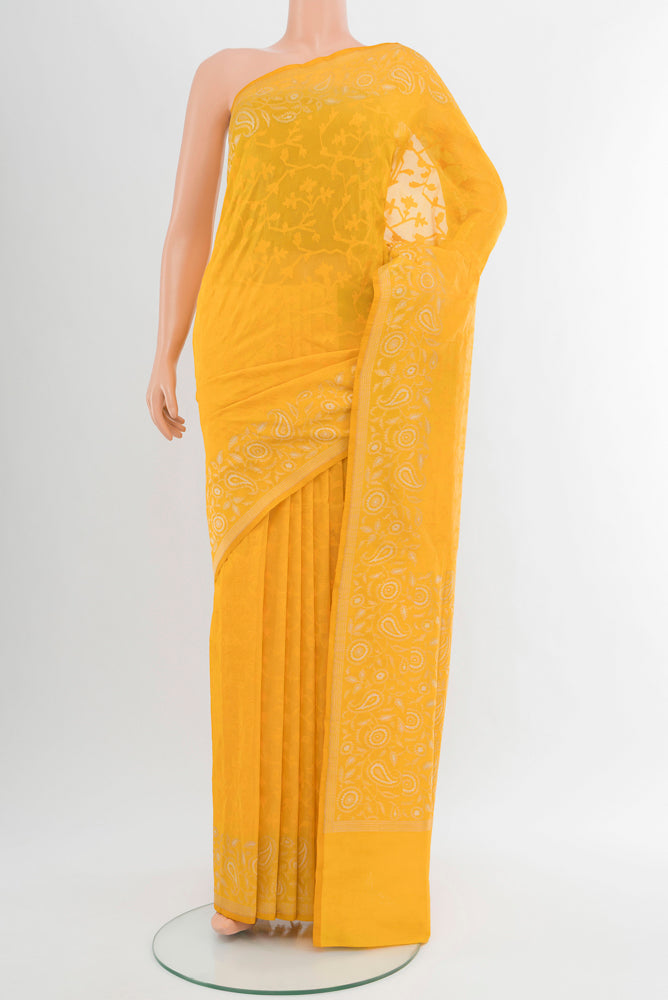 Pure Silk Pure Zari Yellow Banarasi Georgette Saree with Zari Butta on the body and Silk Border.  displayed on a mannequin