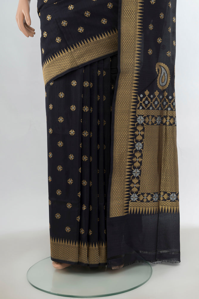 Pleats and pallu of Black Banarasi Silk Saree with Zari Butta on the body and Silk Border. 