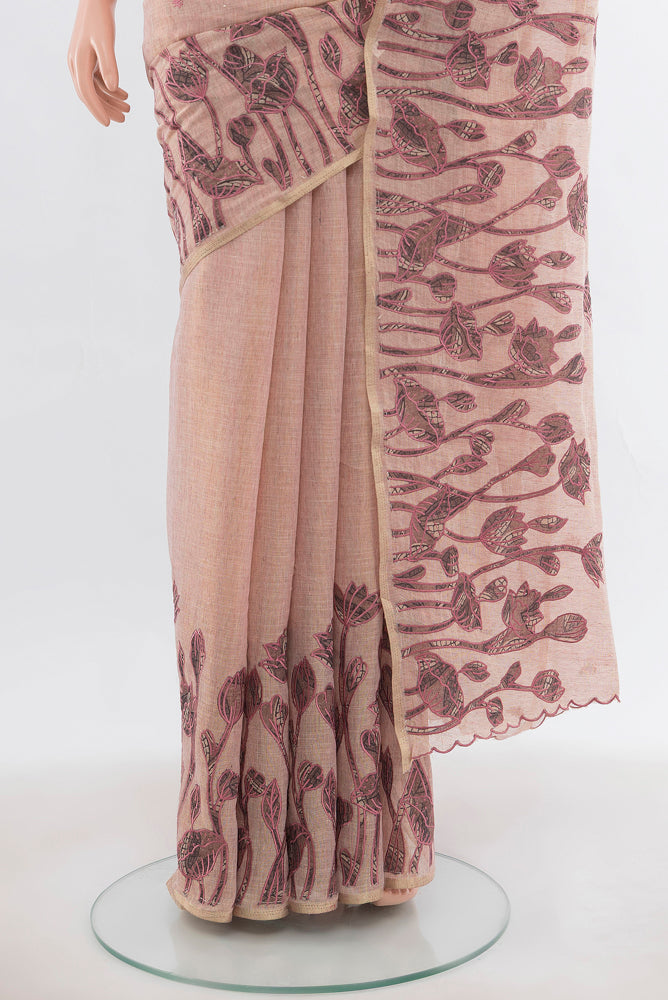 Pleats and pallu of Dark Beige Art Silk Saree with Floral Print on the body and Silk Border. 