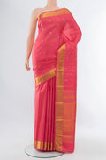 Rose pink Kanchipuram Silk Saree with Zari Butta on the body and Silk Border.  displayed on a mannequin
