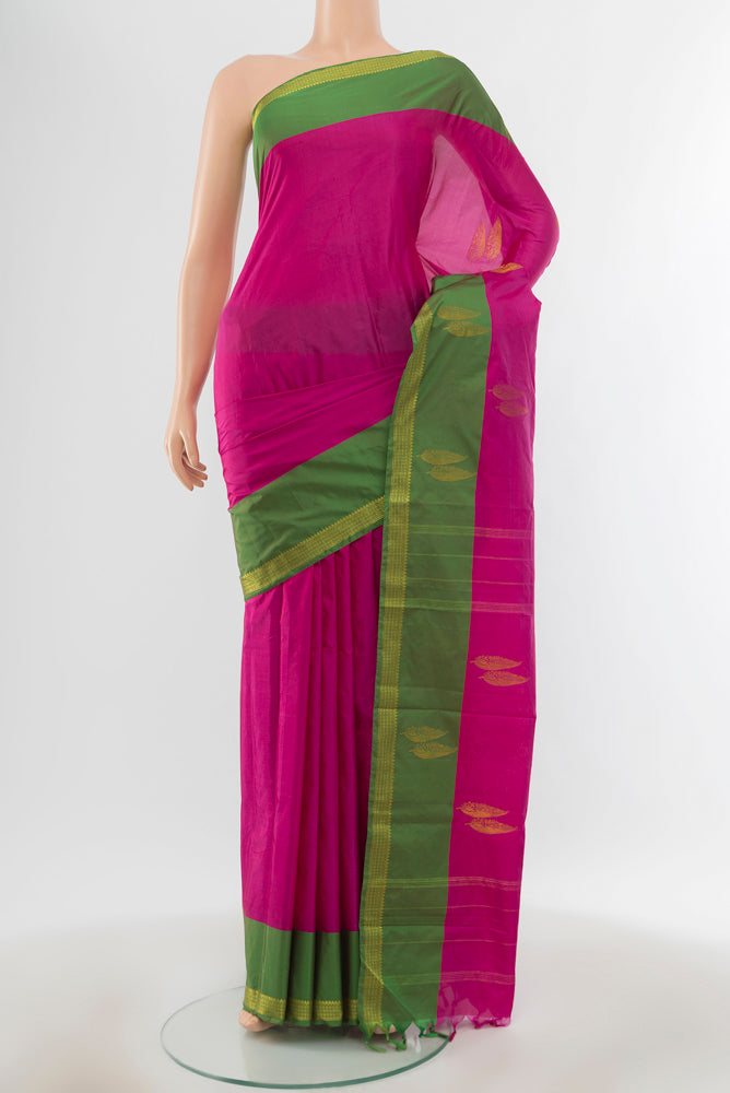 Purple Bangalore Silk Saree with Zari Butta on the body and Silk Border.  displayed on a mannequin