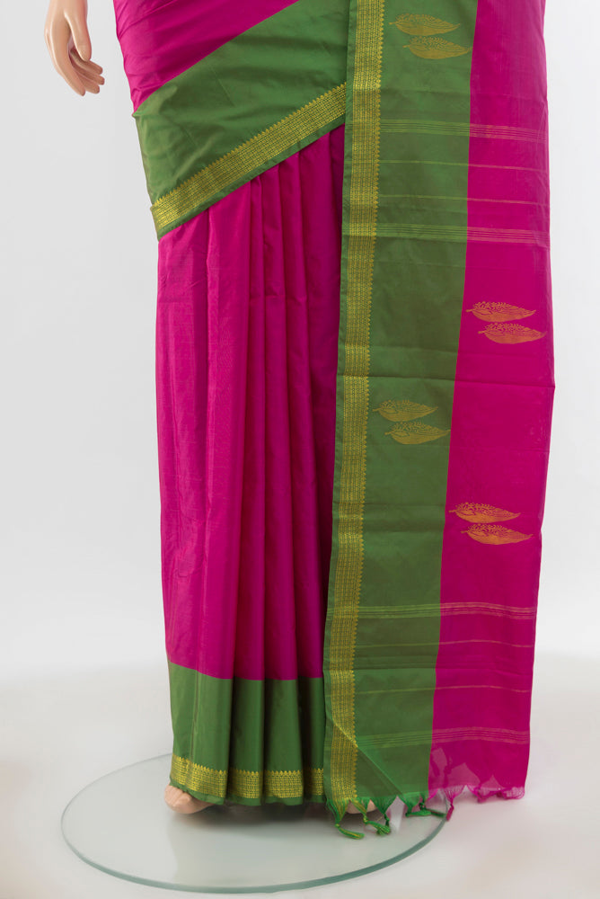 Pleats and pallu of Purple Bangalore Silk Saree with Zari Butta on the body and Silk Border. 