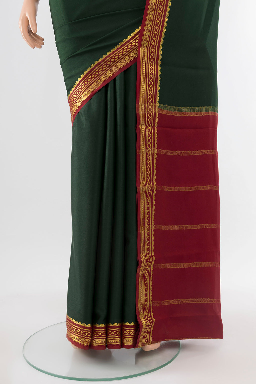 Pleats and pallu of Mint Green Mysore Crepe Saree with Plain Body and Silk Border. 