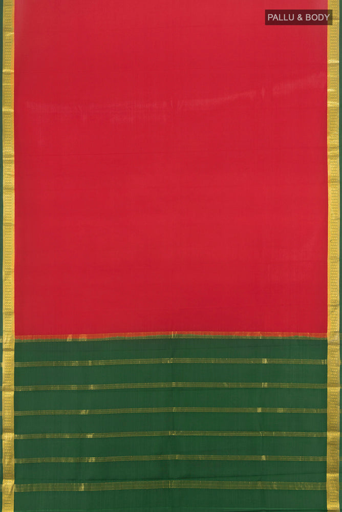Flat view of Pure Silk Pure Zari Red Mysore Crepe Saree with Zari Butta on the body and Silk Border. 