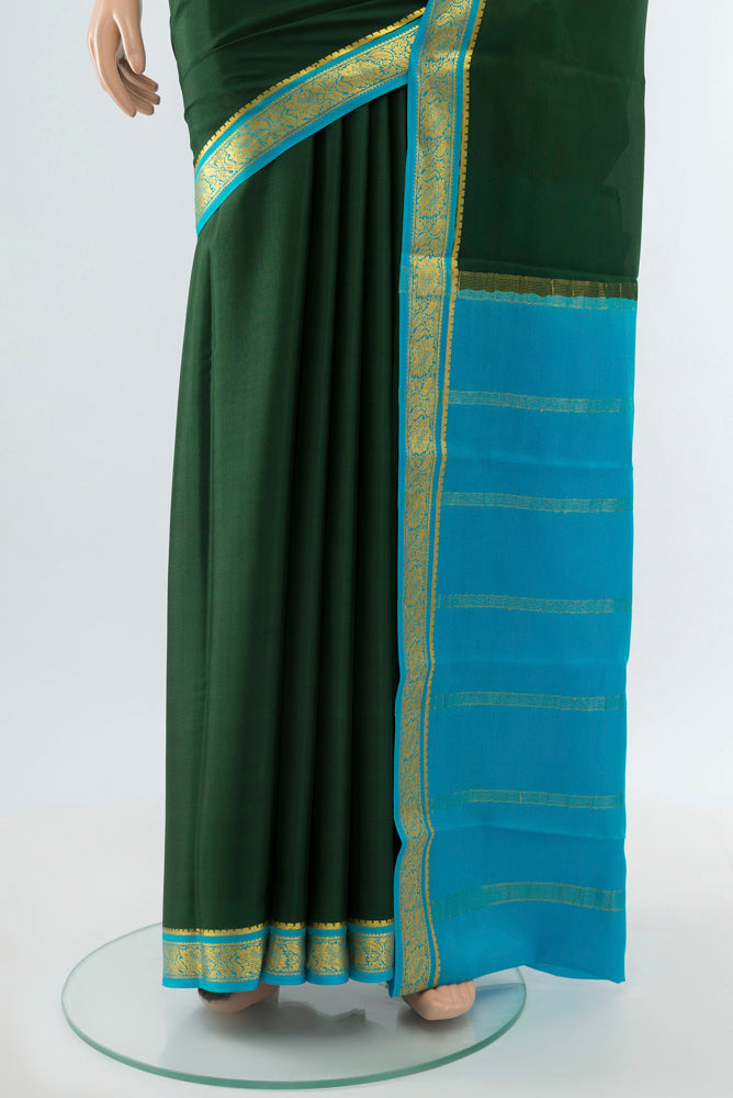 Pleats and pallu of Bottle Green Mysore Crepe Saree with Plain Body and Silk Border. 