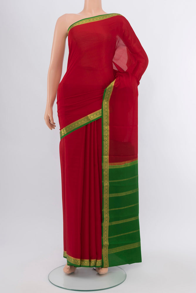 Red Mysore Crepe Saree with Zari Butta on the body and Silk Border.  displayed on a mannequin