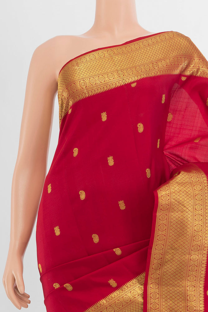 Border image of Pure Silk Pure Zari Maroon Kanchipuram Saree with Zari Butta on the body and Silk Border. 