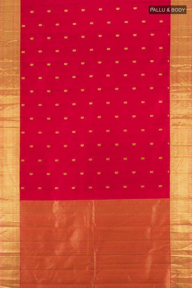 Flat view of Pure Silk Pure Zari Maroon Kanchipuram Saree with Zari Butta on the body and Silk Border. 