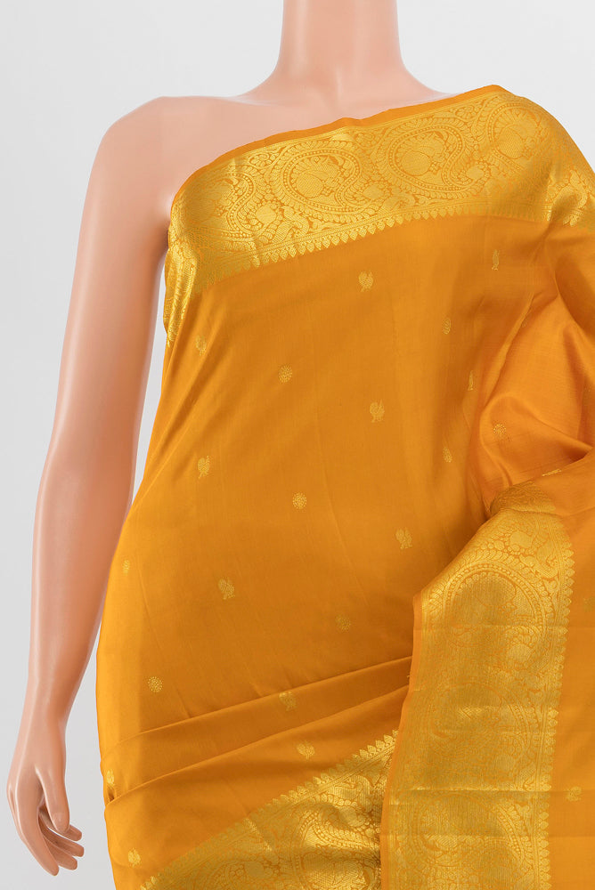 Border image of Pure Silk Pure Zari Mustard Kanchipuram Saree with Zari Butta on the body and Silk Border. 
