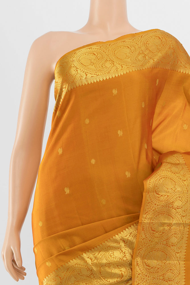 Border image of Mustard Kanchipuram Silk Saree with Zari Butta on the body and Silk Border. 