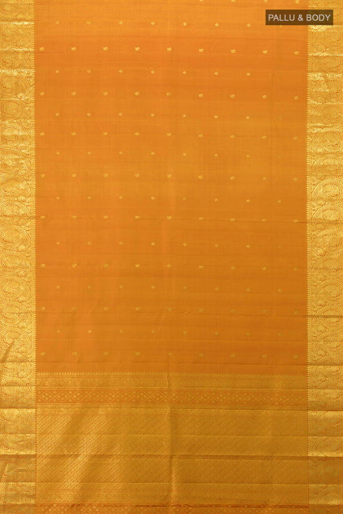 Flat view of Mustard Kanchipuram Silk Saree with Zari Butta on the body and Silk Border. 