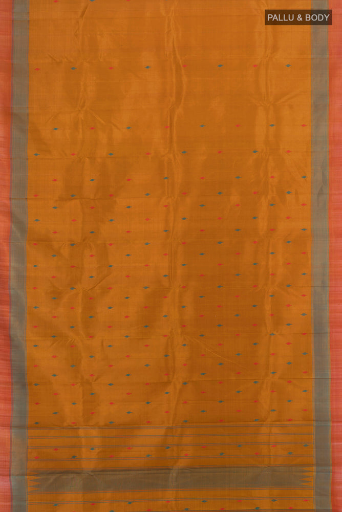 Flat view of Brown Kanchipuram Silk Saree with Zari Butta on the body and Silk Border. 