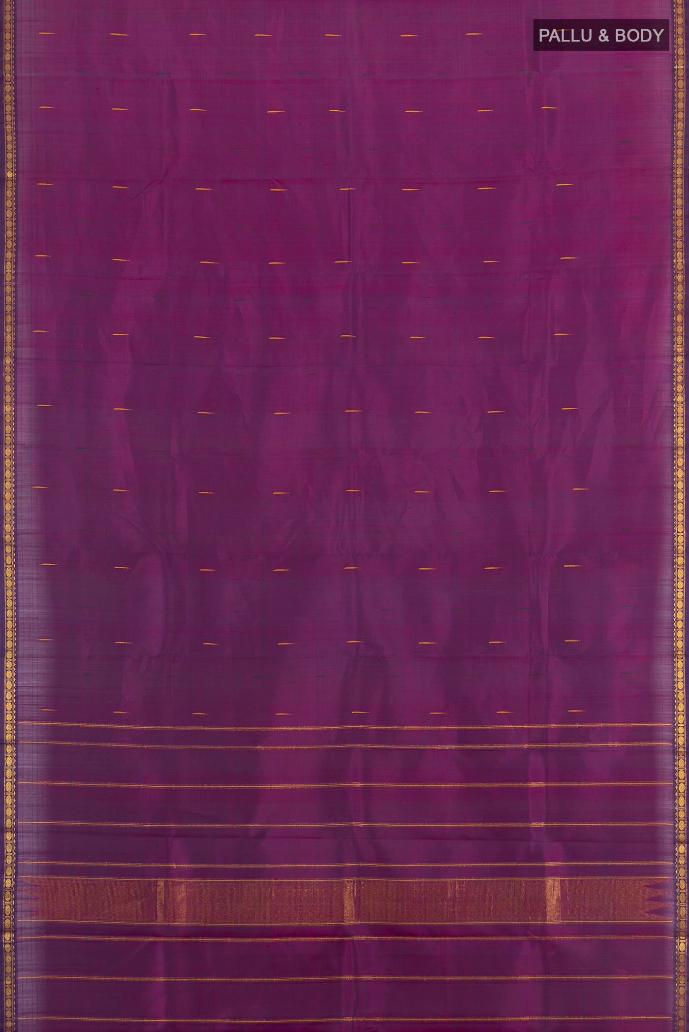 Flat view of Purple Kanchipuram Silk Saree with Zari Butta on the body and Zari Border. 