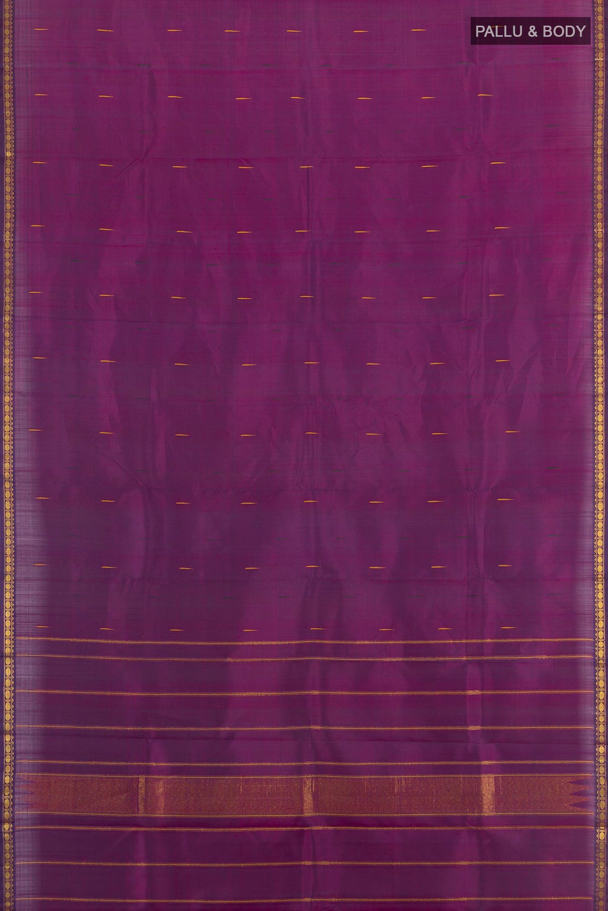 Flat view of Purple Kanchipuram Silk Saree with Zari Butta on the body and Zari Border. 