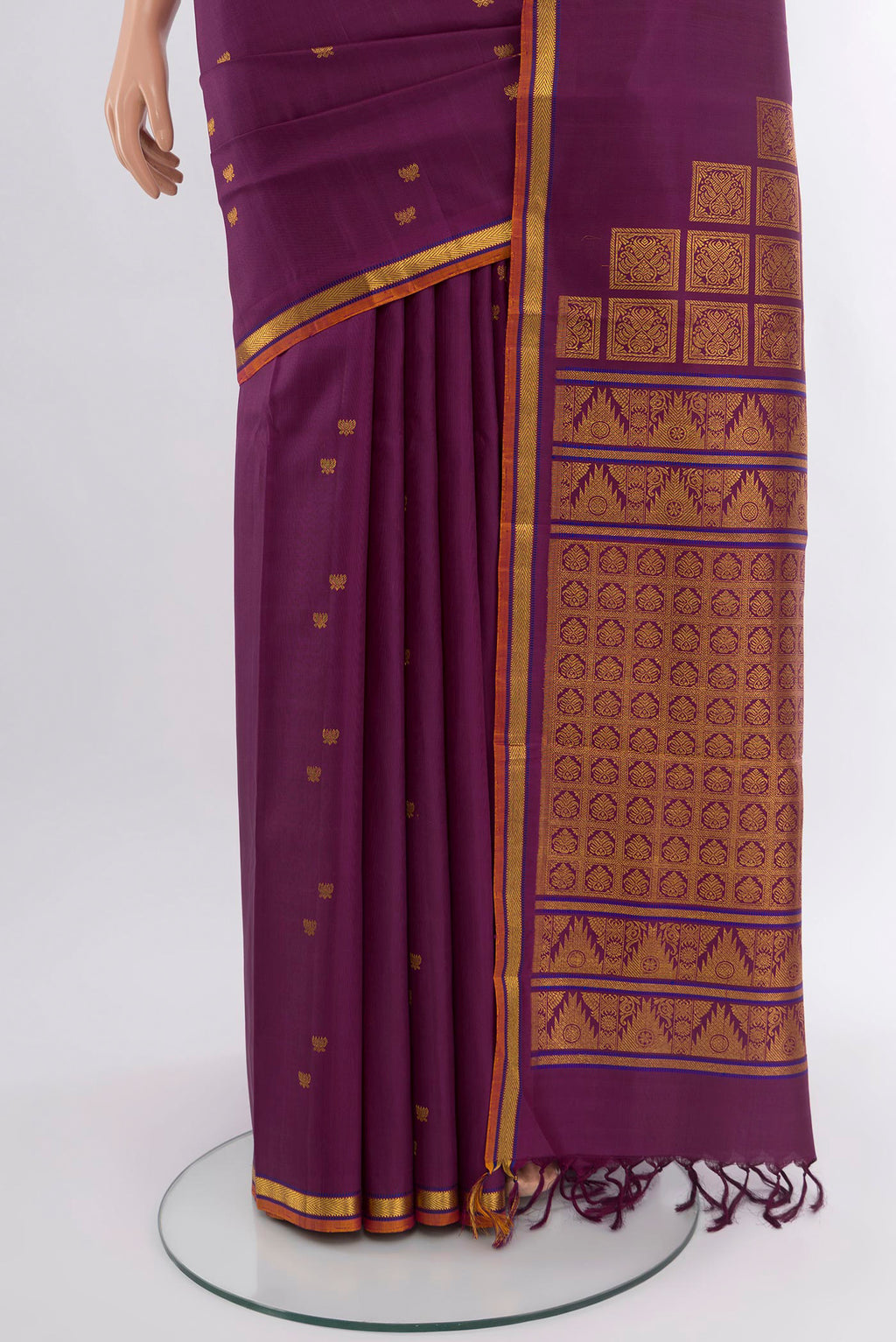 Pleats and pallu of Purple Kanjivaram Silk Saree with Zari Butta on the body and Zari Border. 