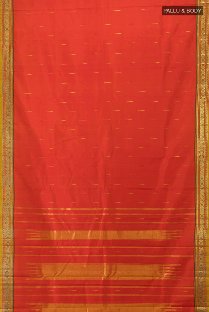 Flat view of Red Kanchipuram Silk Saree with Zari Butta on the body and Silk Border. 
