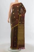 Mehandi Green Kanjivaram Silk Saree with Zari Butta on the body and Silk Border.  displayed on a mannequin