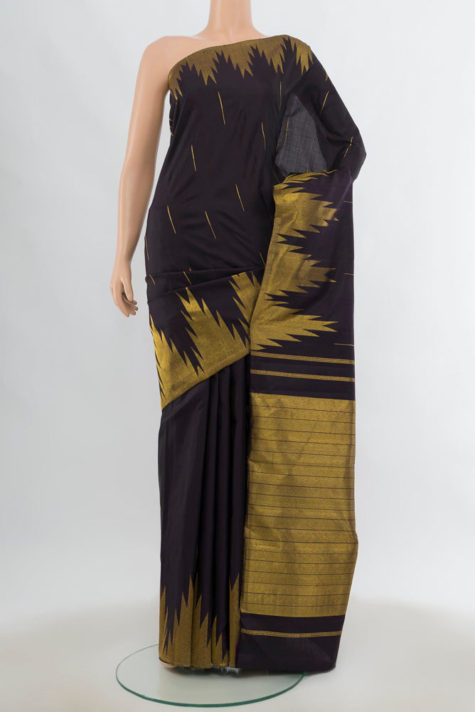 Pure Silk Pure Zari Black Kanjivaram Saree with Zari Butta on the body and Silk Border.  displayed on a mannequin