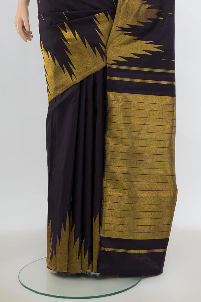 Pleats and pallu of Pure Silk Pure Zari Black Kanjivaram Saree with Zari Butta on the body and Silk Border. 