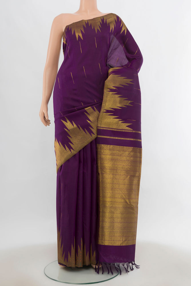 Violet Kanjivaram Silk Saree with Zari Butta on the body and Silk Border.  displayed on a mannequin