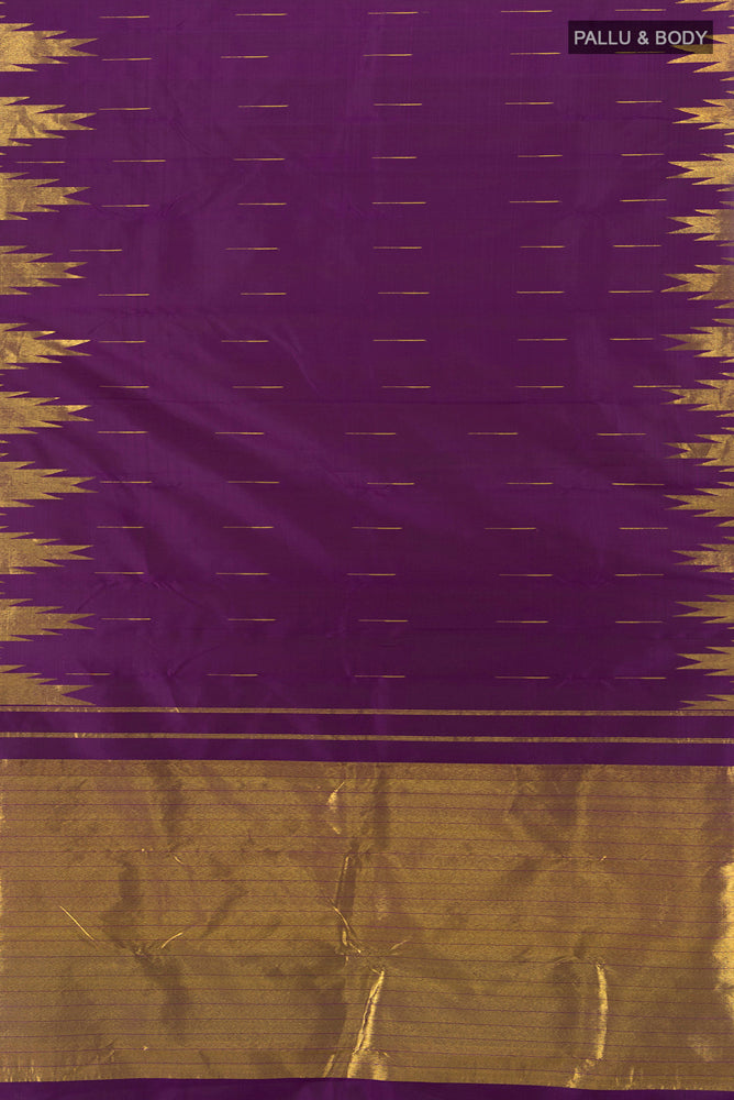 Flat view of Violet Kanjivaram Silk Saree with Zari Butta on the body and Silk Border. 