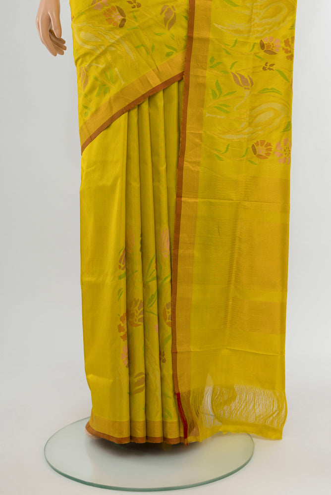 Pleats and pallu of Light Green Uppada Silk Saree with Zari Butta on the body and Silk Border. 