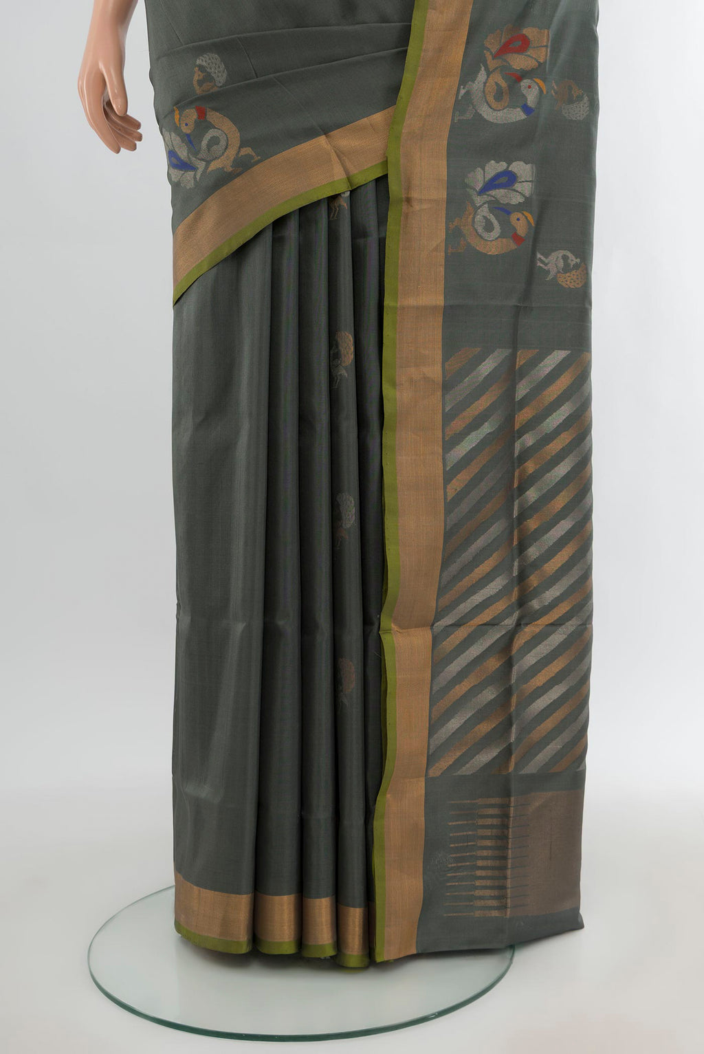 Pleats and pallu of Grey Uppada Silk Saree with Zari Butta on the body and Zari Border. 