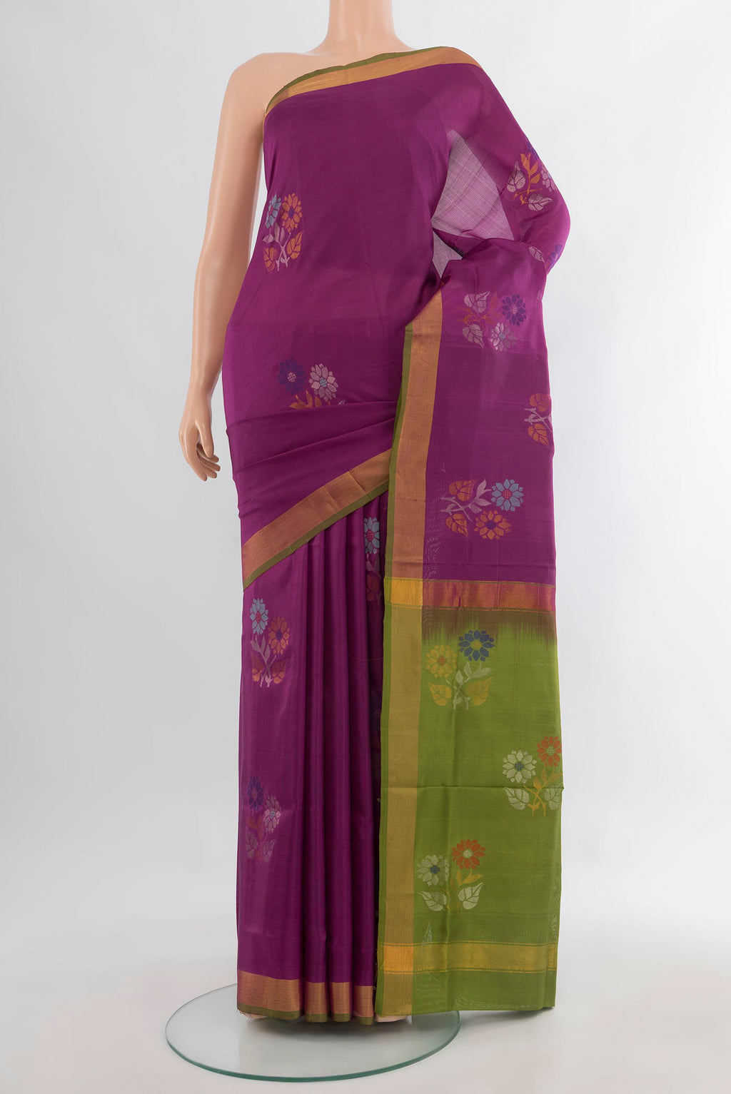 Pure Silk Magenta Uppada Saree with Zari Butta on the body and Zari Border.  displayed on a mannequin