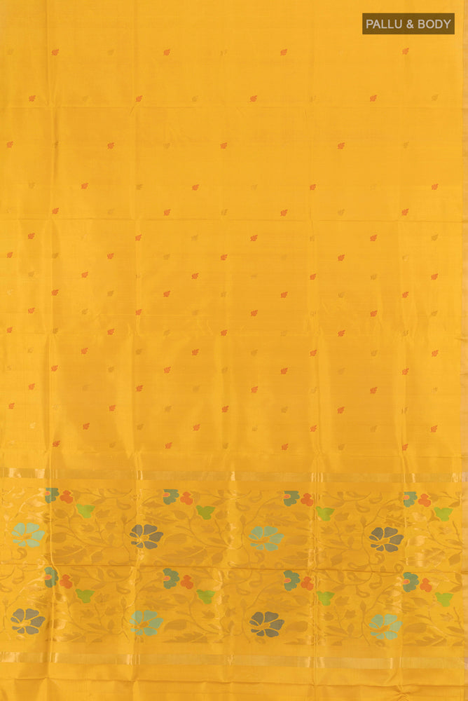 Flat view of Mustard Uppada Silk Saree with Zari Butta on the body and Silk Border. 