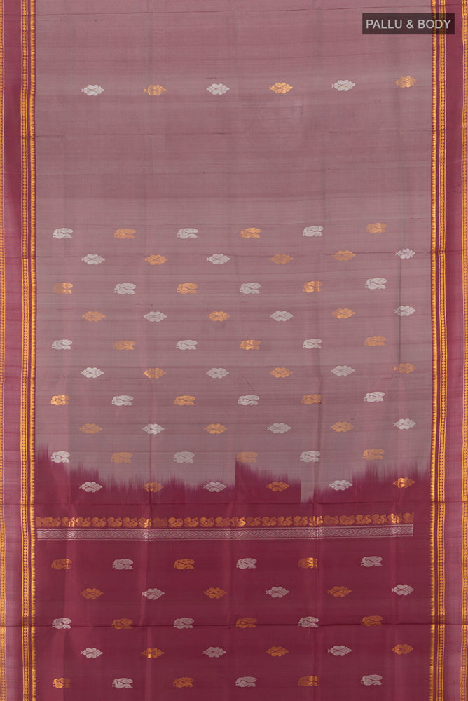 Flat view of Brown Uppada Silk Saree with Zari Butta on the body and Silk Border. 