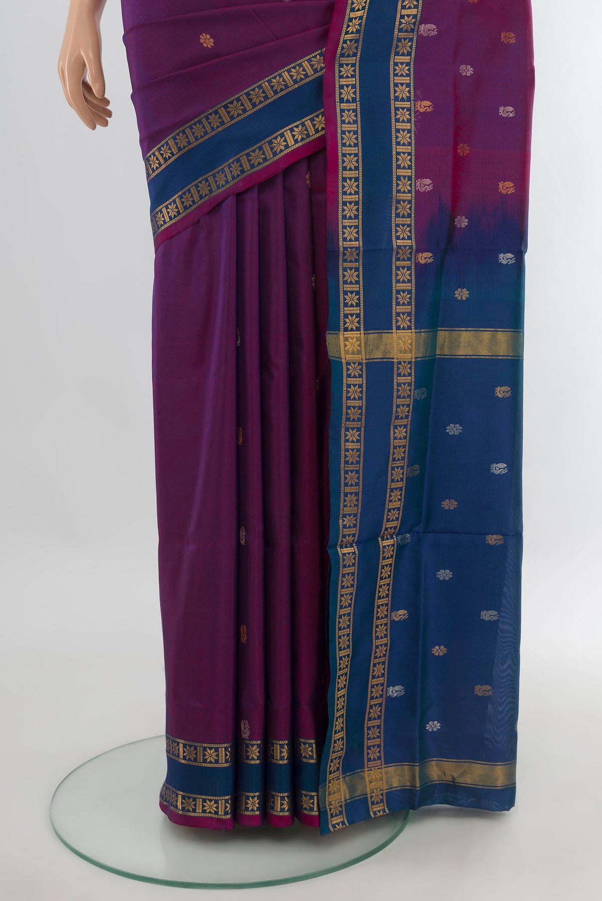Pleats and pallu of Pure Silk Magenta Uppada Saree with Zari Butta on the body and Plain Border. 