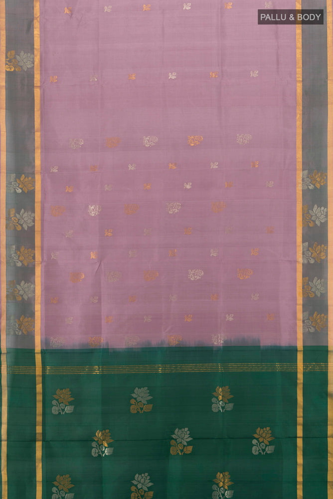 Flat view of Bronze Uppada Silk Saree with Zari Butta on the body and Silk Border. 