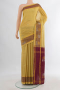 Pure Silk Sandal Uppada Saree with Zari Butta on the body and Plain Border.  displayed on a mannequin