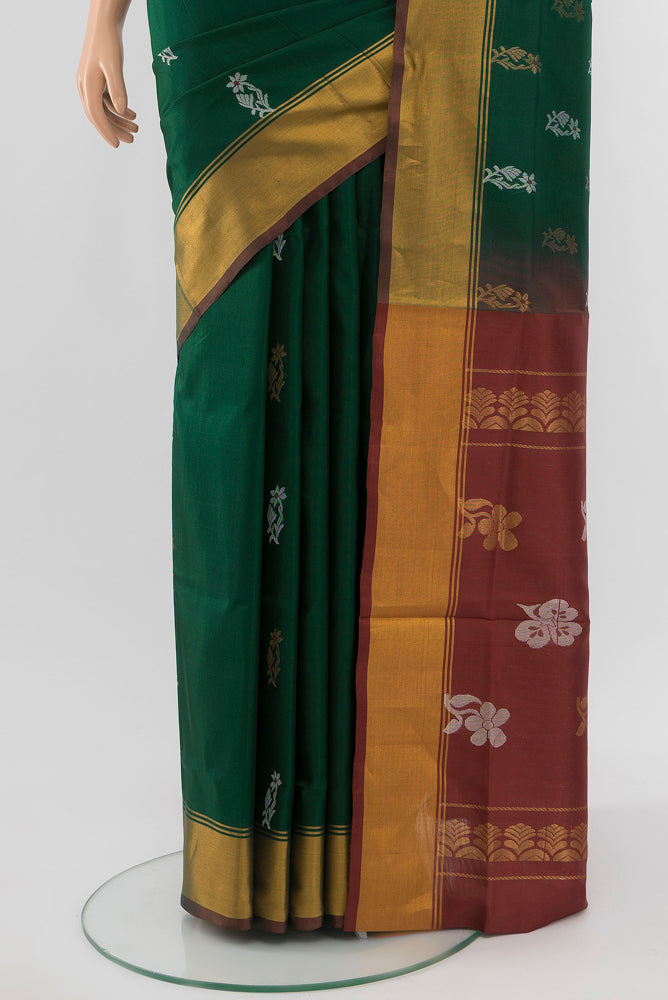 Pleats and pallu of Mint Green Uppada Silk Saree with Zari Butta on the body and Silk Border. 