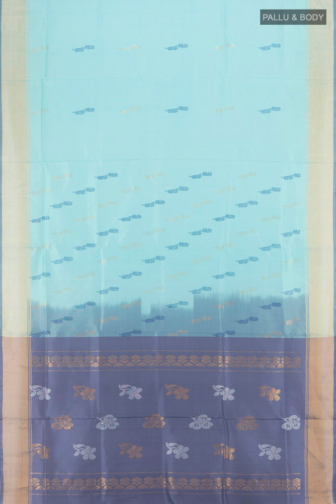 Flat view of Sky Blue Uppada Silk Saree with Zari Butta on the body and Silk Border. 