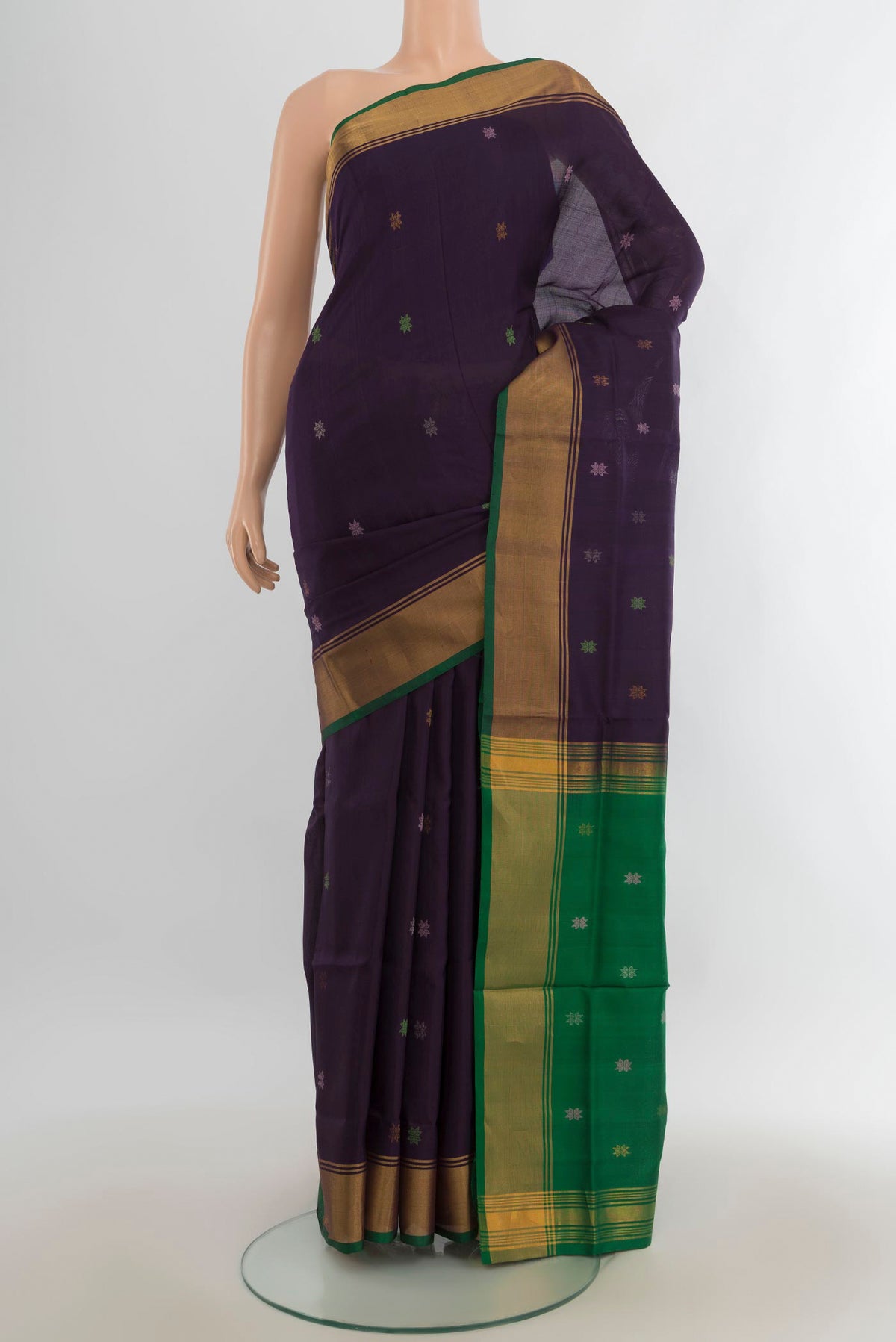 Pure Silk Violet Uppada Saree with Zari Butta on the body and Silk Border.  displayed on a mannequin