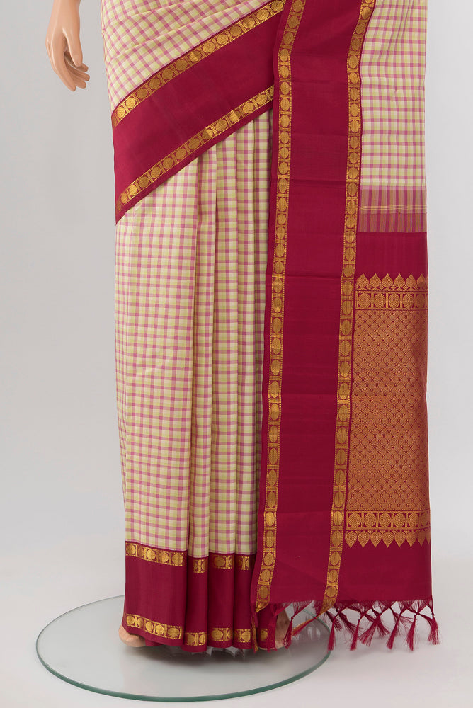 Pleats and pallu of Multi Color Kanjivaram Silk Saree with Zari Butta on the body and Silk Border. 