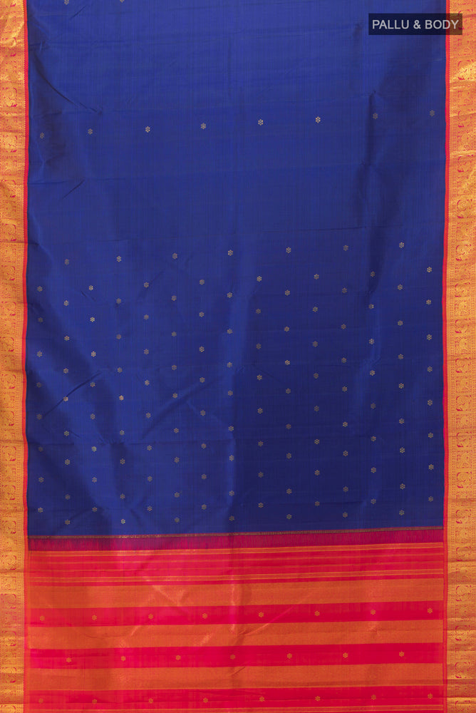 Flat view of Dark Blue Kanjivaram Silk Saree with Zari Butta on the body and Silk Border. 