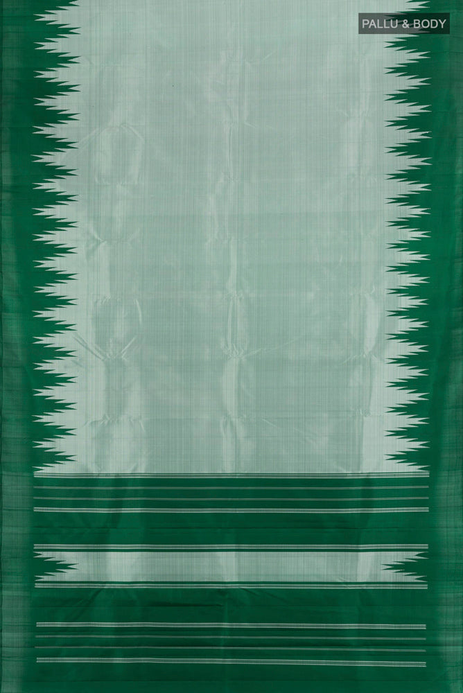 Flat view of Light Green Kanjivaram Silk Saree with Zari Butta on the body and Silk Border. 
