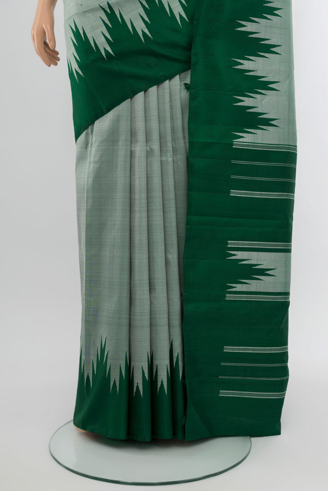 Pleats and pallu of Light Green Kanjivaram Silk Saree with Zari Butta on the body and Silk Border. 