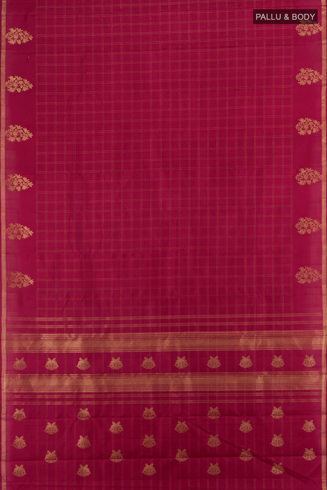 Flat view of Maroon Kanjivaram Silk Saree with Zari Butta on the body and Silk Border. 