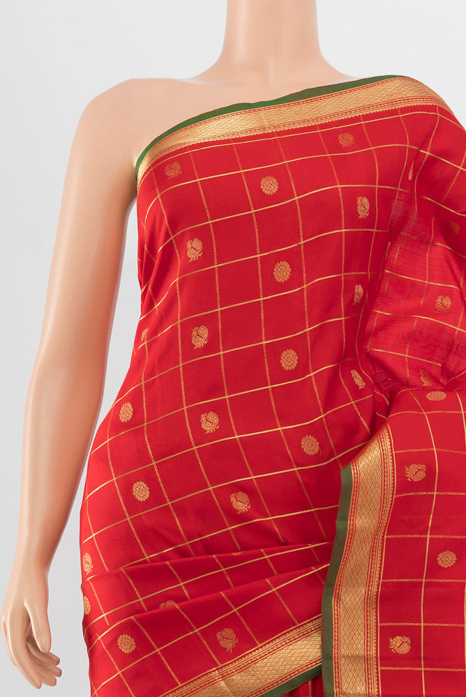 Border image of Pure Silk Pure Zari Red Kanjivaram Saree with Zari Butta on the body and Silk Border. 