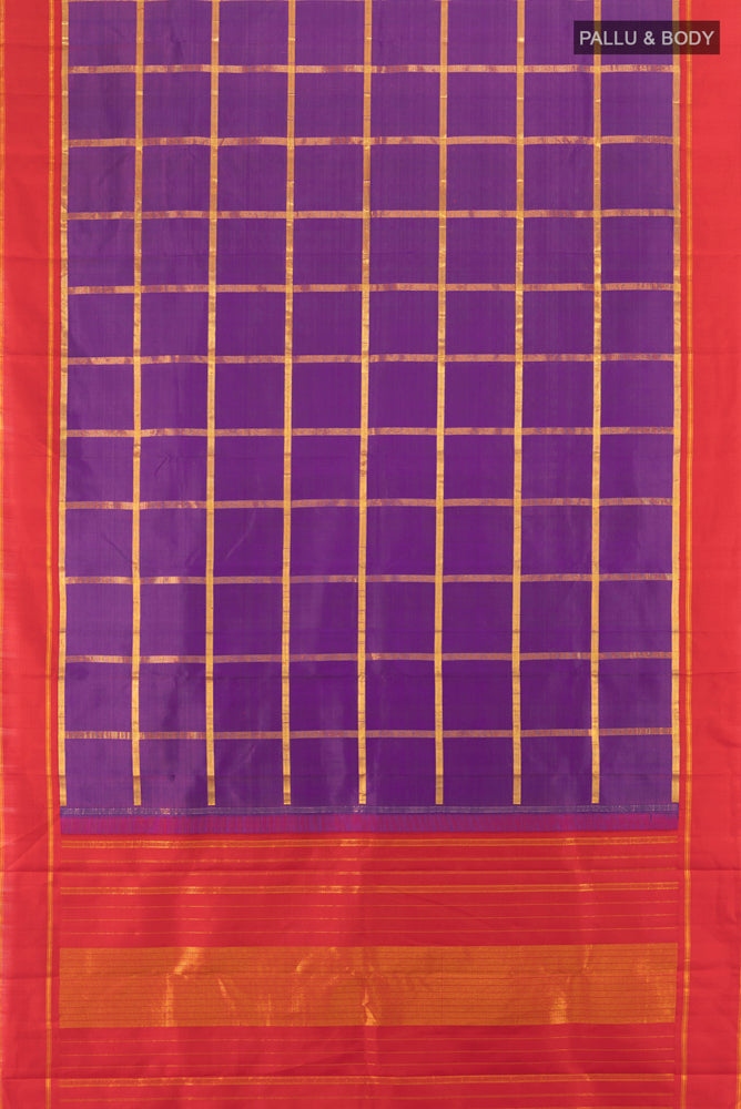 Flat view of Magenta Kanchipuram Silk Saree with Zari Butta on the body and Silk Border. 