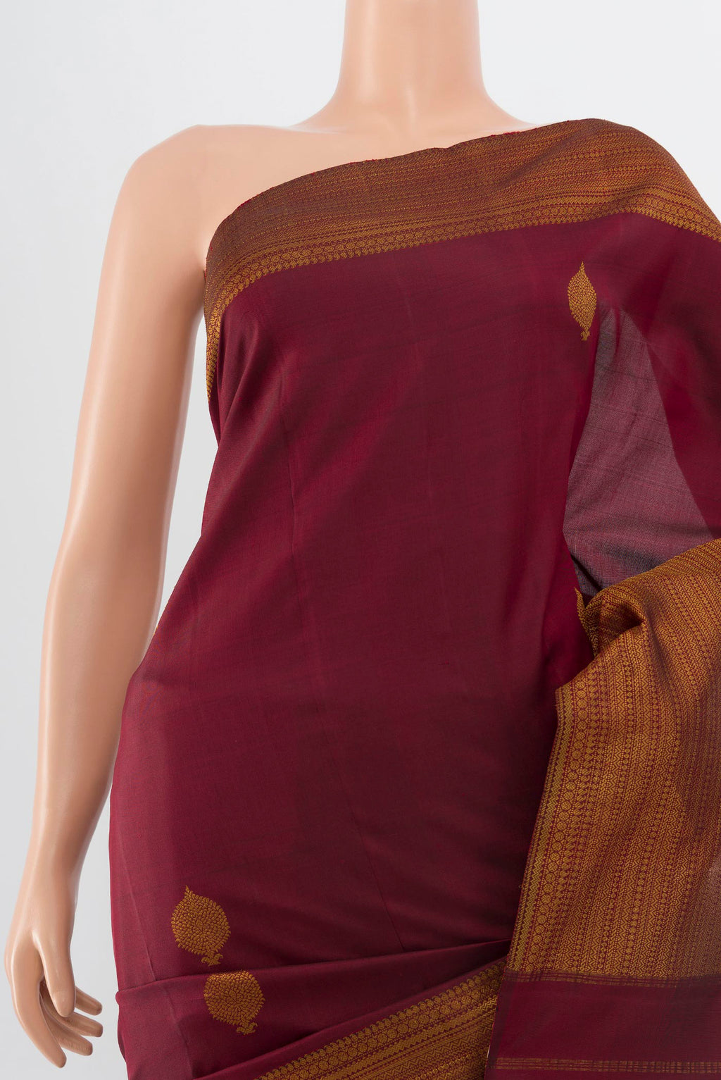 Border image of Pure Silk Pure Zari Maroon Kanjivaram Saree with Zari Butta on the body and Silk Border. 