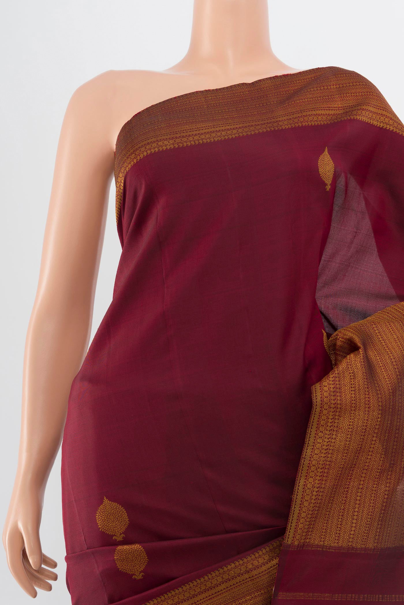 Border image of Pure Silk Pure Zari Maroon Kanjivaram Saree with Zari Butta on the body and Silk Border. 
