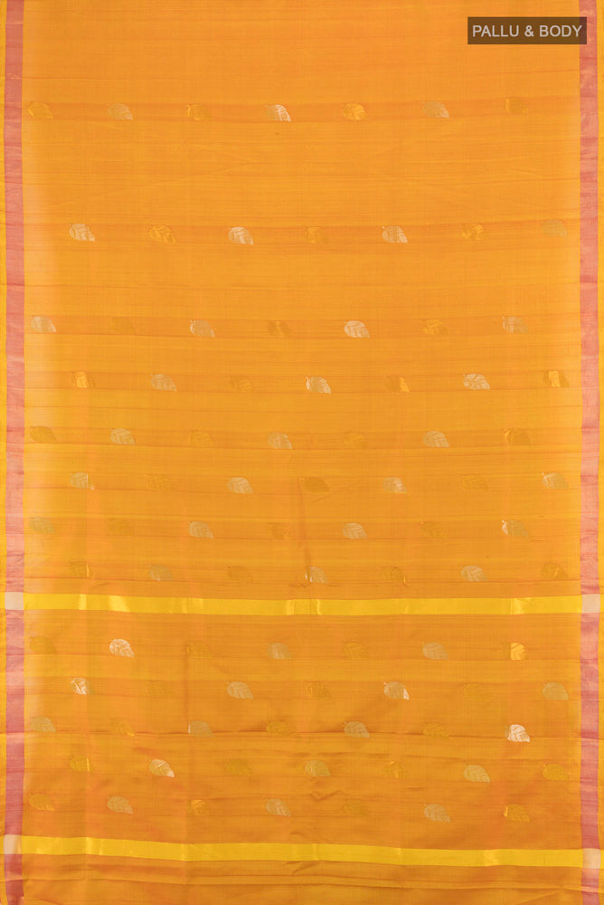 Flat view of Mustard Uppada Silk Saree with Zari Butta on the body and Fancy Border. 