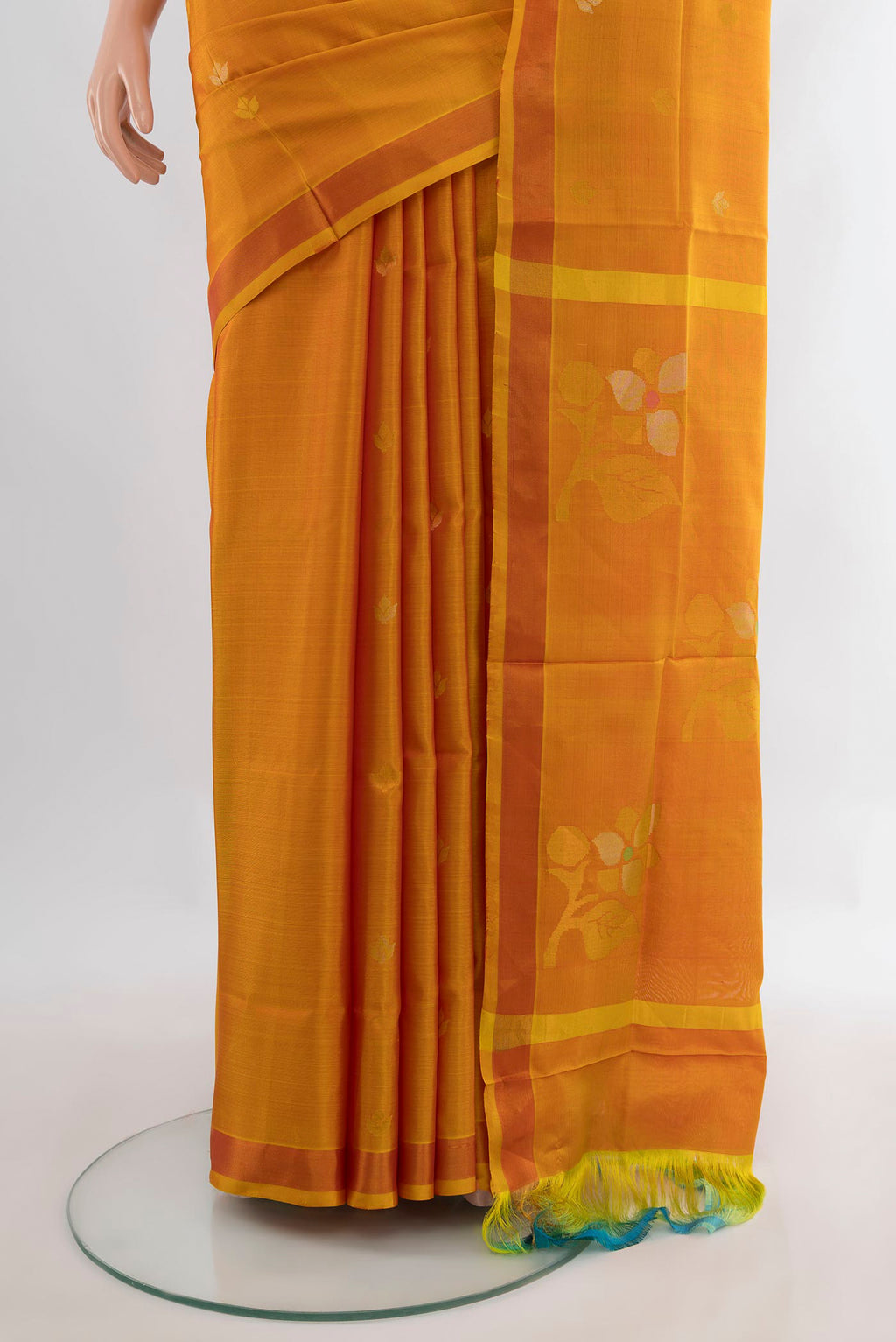Pleats and pallu of Pure Silk Mustard Uppada Saree with Zari Butta on the body and Zari Border. 