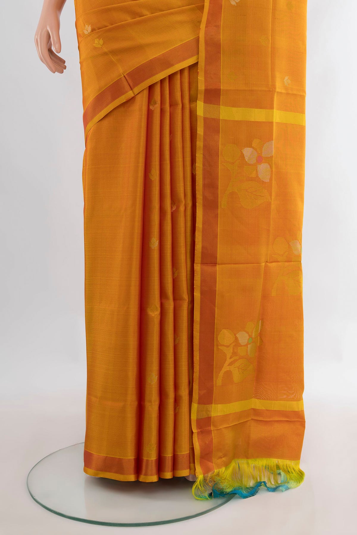 Pleats and pallu of Pure Silk Mustard Uppada Saree with Zari Butta on the body and Zari Border. 