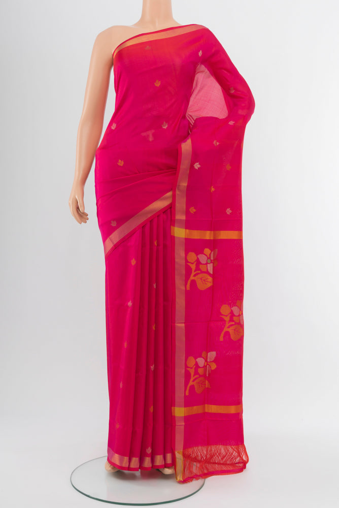 Peach Uppada Silk Saree with Zari Brocade on the body and Silk Border.  displayed on a mannequin