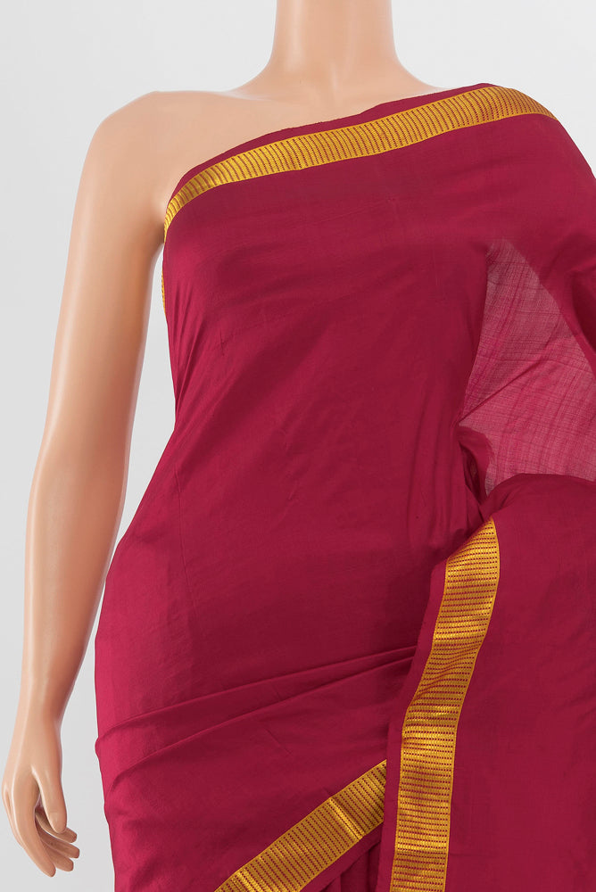 Border image of Maroon Kanjivaram Silk Saree with Zari Butta on the body and Silk Border. 